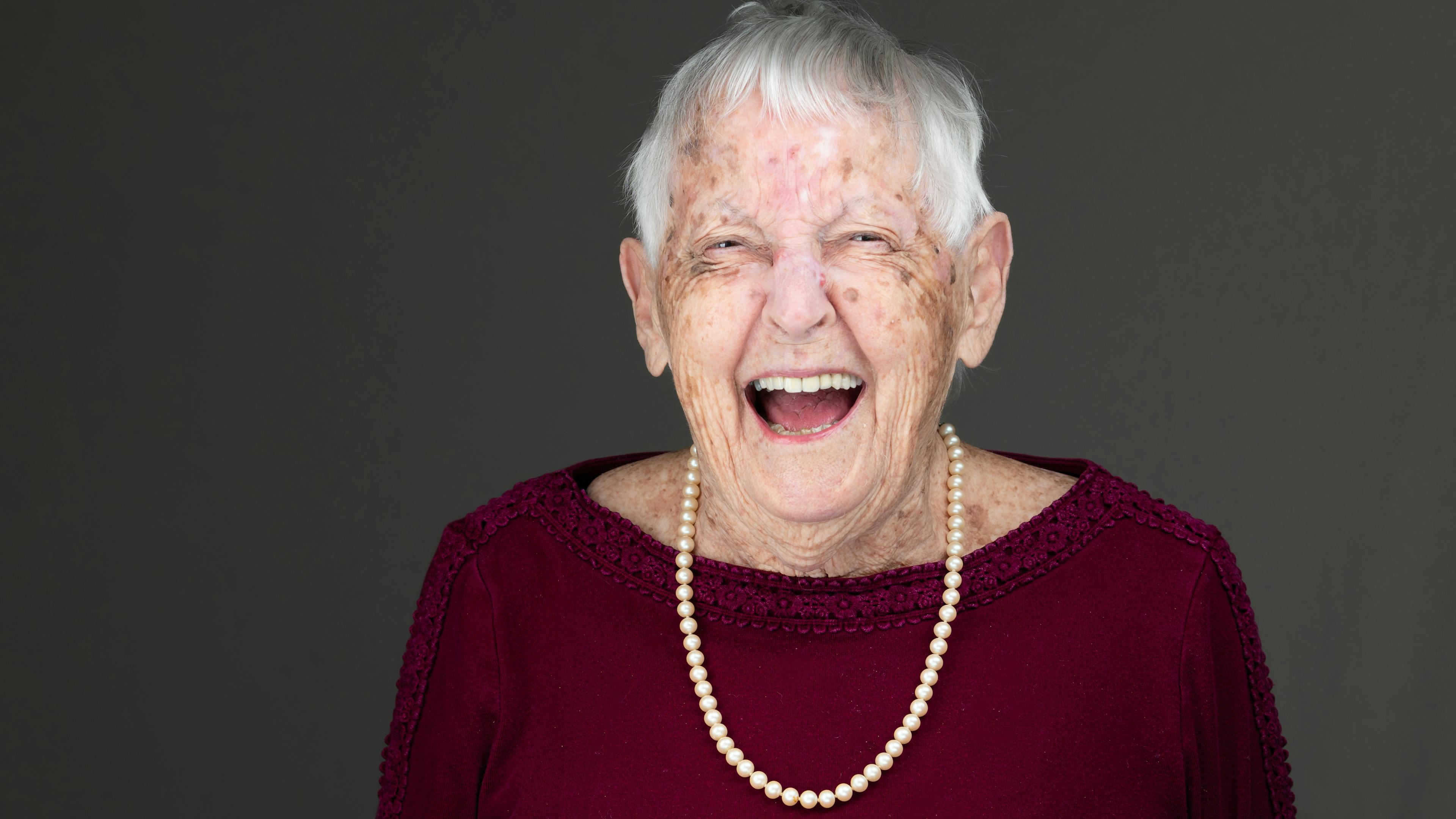 Laughing senior headshot courtesy of Peter Istvan Photography